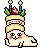 A cat lies in a cheesecake pose with a layered cake on its head