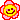 A pink flower with a smiley face