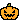 A ghost pops out of a jack o'lantern