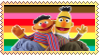 A stamp of Bert and Ernie from Sesame Street over a rainbow Pride flag.