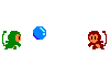 A pair of monkeys throw a ball back and forth